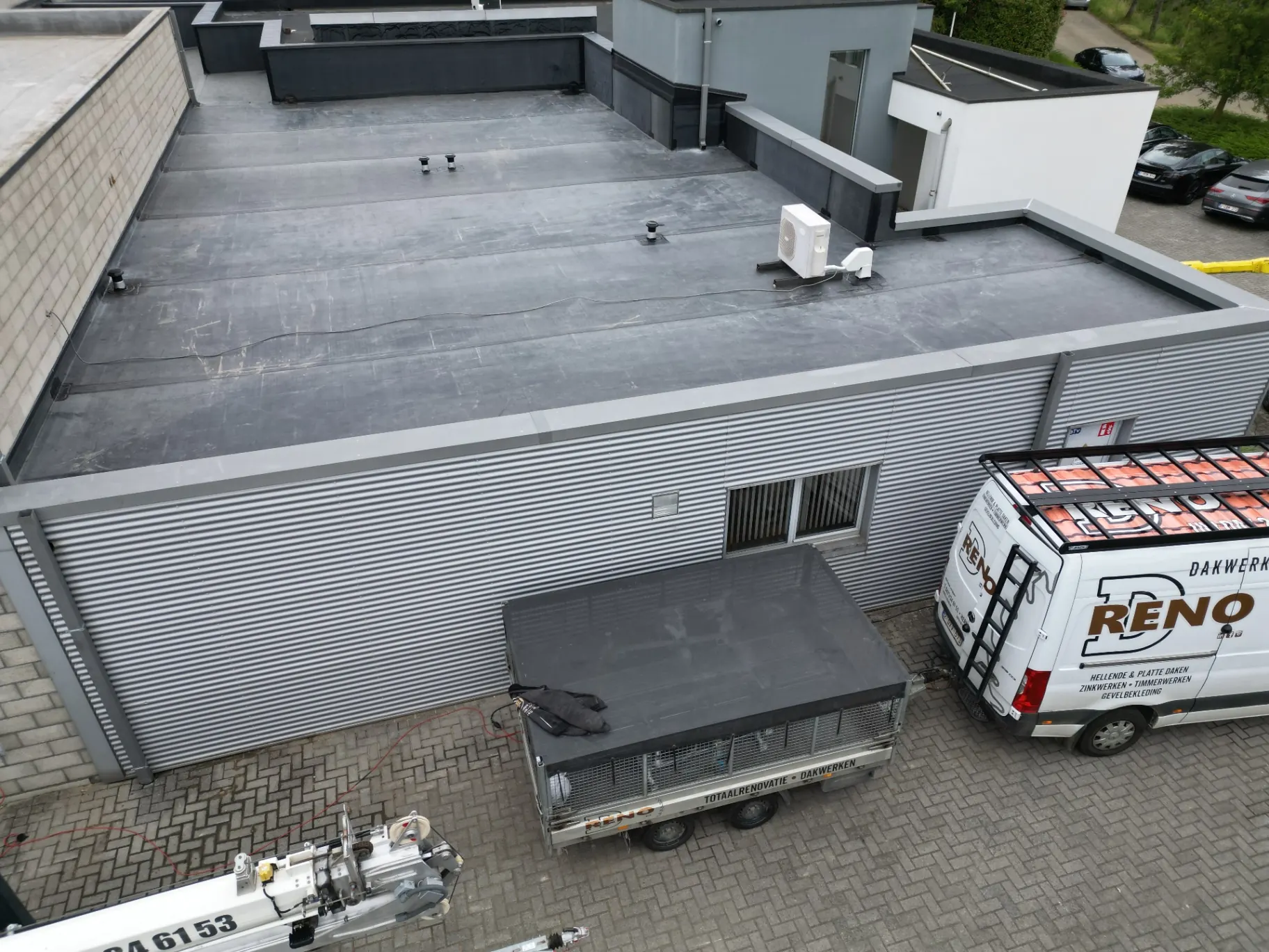 B2B plat dak renovatie voor Promation, hoofdbeeld van het project in Heist-op-den-Berg