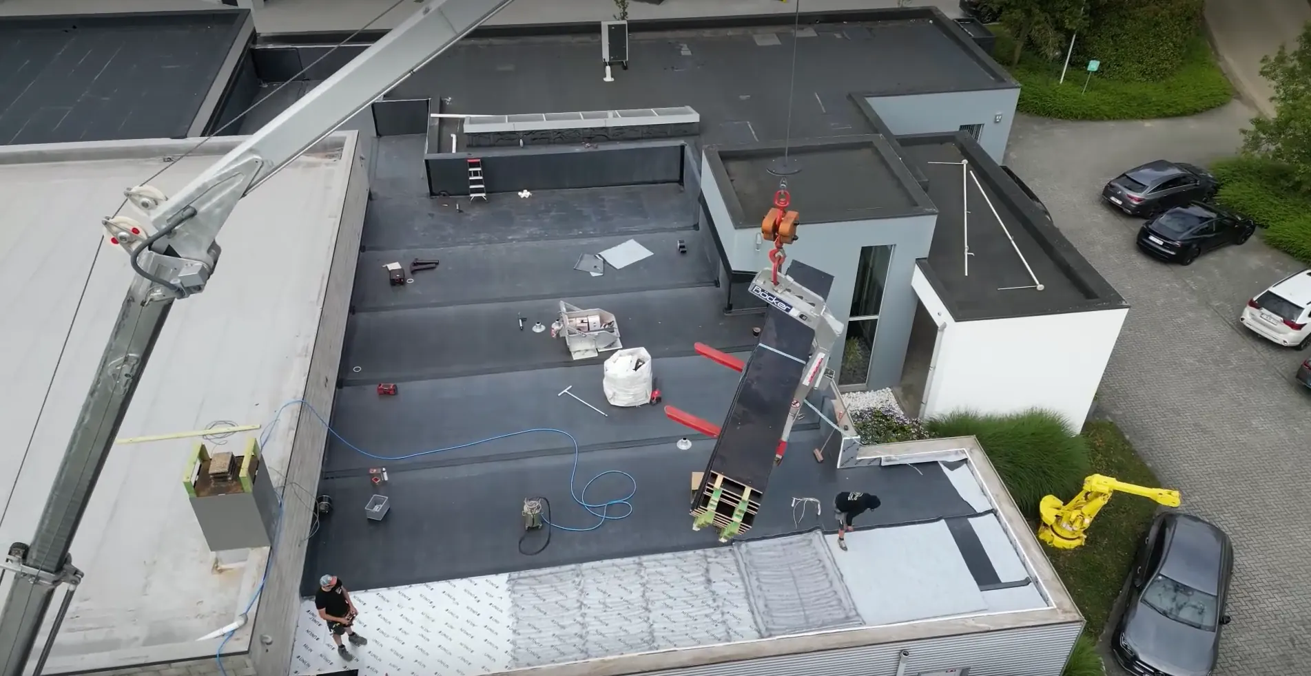 D-RENO crane truck on an EPDM flat roof project